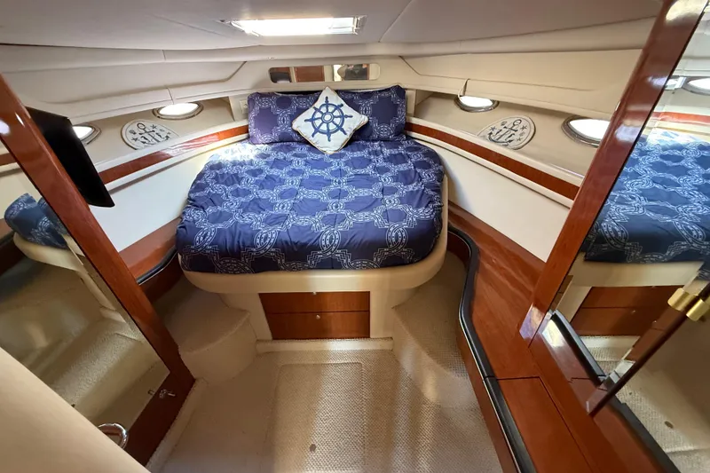 Slide: The Image of Luxurious interior of 2003 Sea Ray 460 Sundancer yacht with elegant wood finishes. - 39