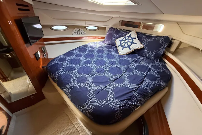 Slide: The Image of Luxurious interior of 2003 Sea Ray 460 Sundancer yacht with plush seating and elegant design. - 40