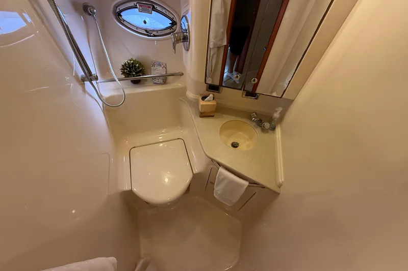 Slide: The Image of Electrical control panel of a 2003 Sea Ray 460 Sundancer boat. - 46