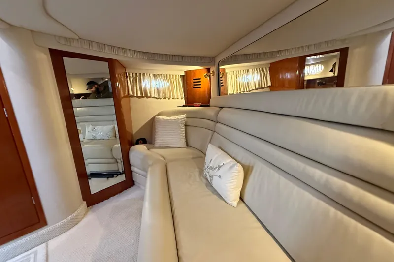 Slide: The Image of Control panel of a 2003 Sea Ray 460 Sundancer boat, featuring switches and gauges. - 47