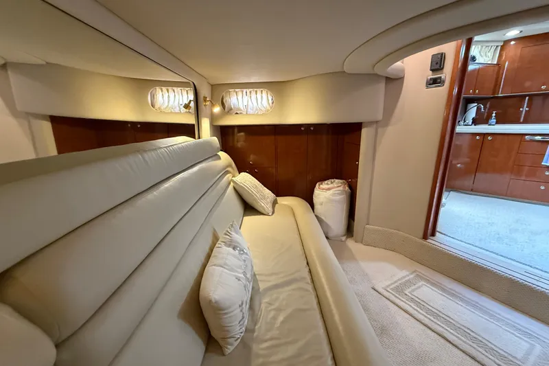 Slide: The Image of Main distribution panel of 2003 Sea Ray 460 Sundancer boat with voltage and amperage gauges. - 48