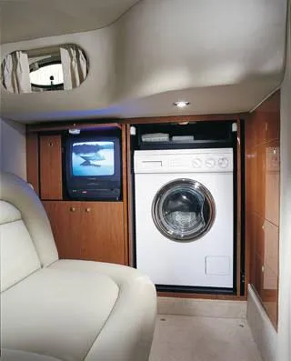 Slide: The Image of Luxurious interior of 2003 Sea Ray 460 Sundancer yacht with white leather seating. - 7