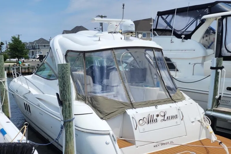 Slide: The Image of 2008 Cruisers Yachts 420 Express docked, featuring sleek design and spacious interior. - 10