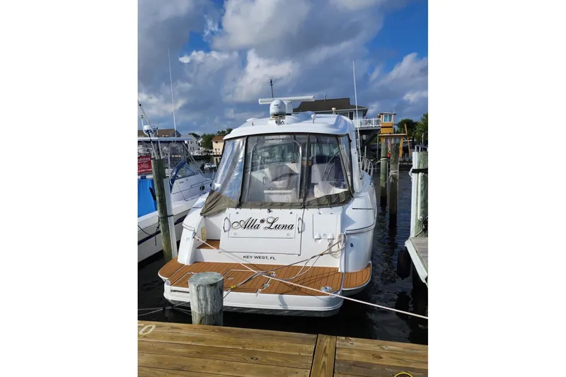 Slide: The Image of 2008 Cruisers Yachts 420 Express docked in Key West marina. - 11