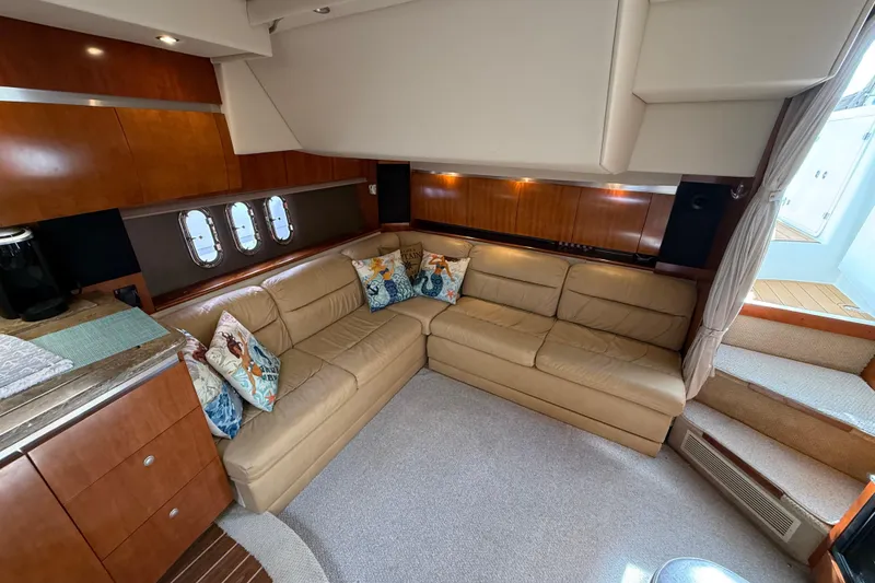 Slide: The Image of Luxurious interior of 2008 Cruisers Yachts 420 Express with leather seating and decorative pillows. - 28