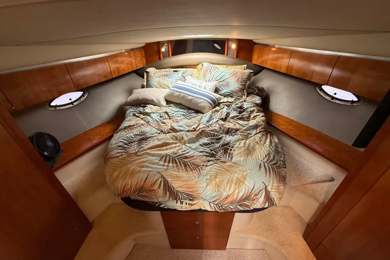 Slide: The Image of Luxurious cabin interior of 2008 Cruisers Yachts 420 Express with cozy bedding. - 33