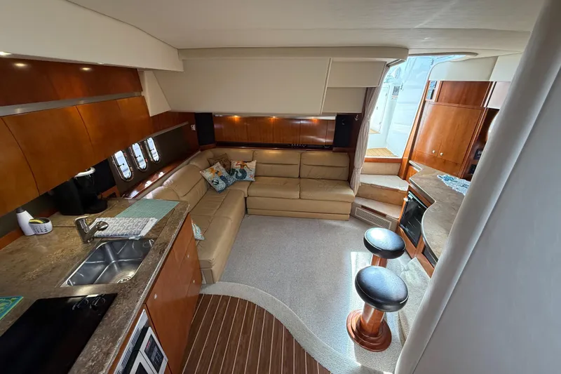 Slide: The Image of Luxurious interior of 2008 Cruisers Yachts 420 Express with modern kitchen and cozy seating area. - 35