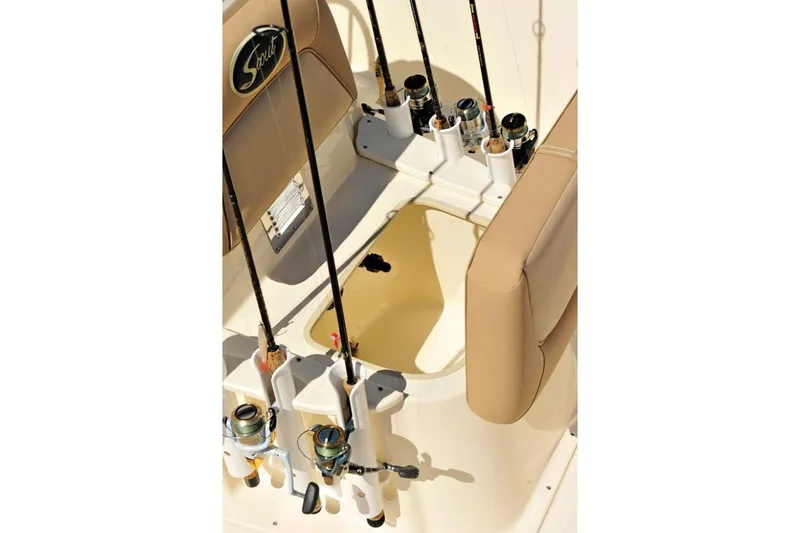 Slide: The Image of Manufacturer Provided Image: 2023 Scout 177 Sport boat interior with fishing rod holders and seating. - 15