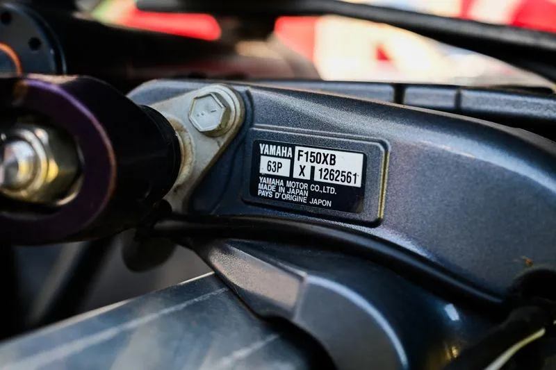 Slide: The Image of Close-up of Yamaha F150XB engine label on 2022 Aloha Pontoon 260 Tropical Series Sundeck. - 10