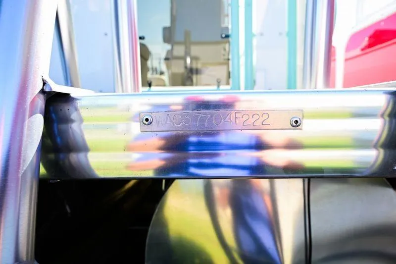 Slide: The Image of 2022 Aloha Pontoon 260 Tropical Series Sundeck, close-up of identification plate. - 11