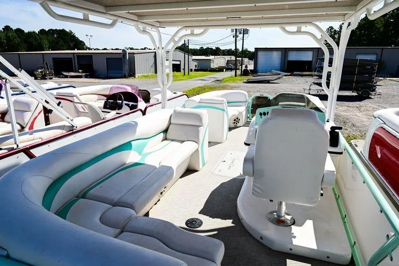 Slide: The Image of 2022 Aloha Pontoon 260 Tropical Series Sundeck with spacious seating and modern design. - 8