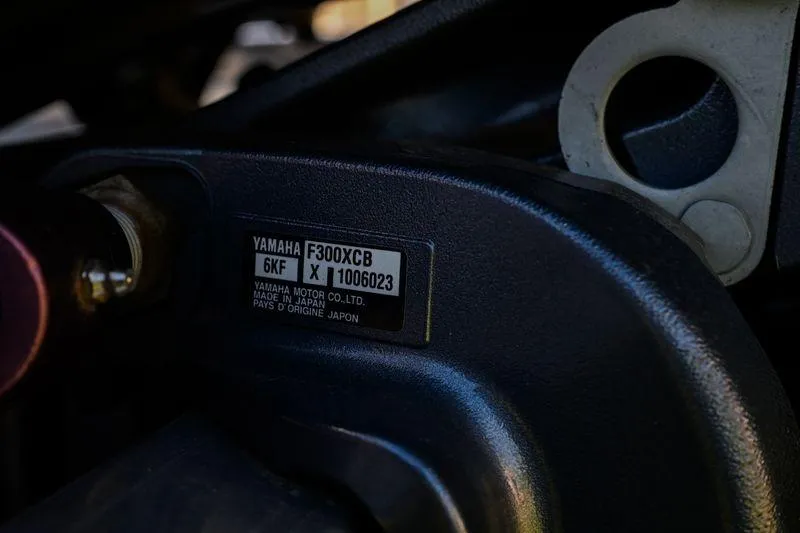 Slide: The Image of Close-up of Yamaha F300XCB engine label on 2023 Aloha Pontoon 260 Paradise Series Sundeck. - 13