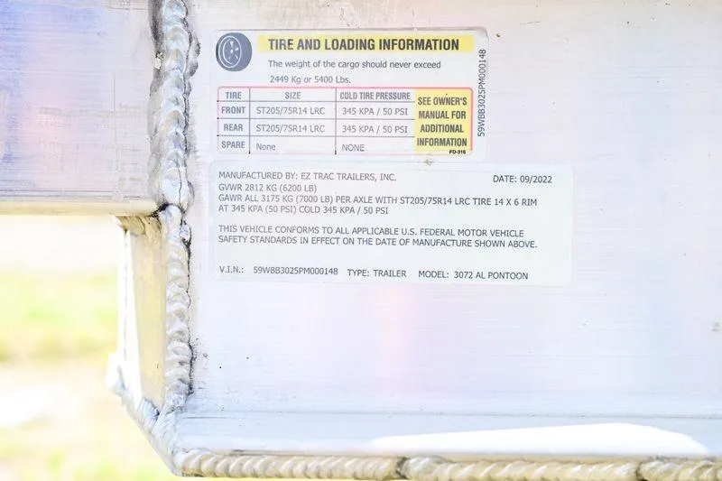 Slide: The Image of Tire and loading information label on 2023 Aloha Pontoon 260 Paradise Series Sundeck. - 14