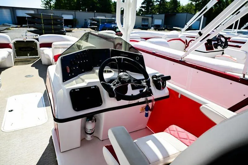 Slide: The Image of 2023 Aloha Pontoon 260 Paradise Series Sundeck, featuring a modern helm and seating area. - 8