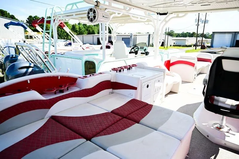 Slide: The Image of 2023 Aloha Pontoon 260 Paradise Series Sundeck with luxurious seating and modern amenities. - 9