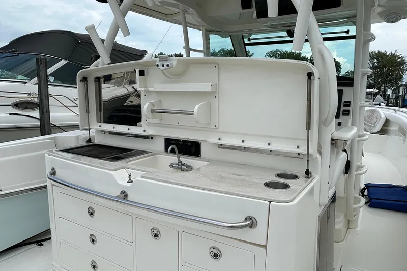 Slide: The Image of Manufacturer Provided Image: 2016 Boston Whaler 370 Outrage galley with built-in microwave oven. - 16