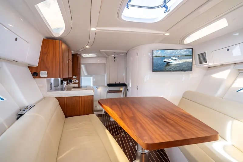 Slide: The Image of Luxurious interior of 2018 Intrepid 407 yacht with wood accents and modern amenities. - 45