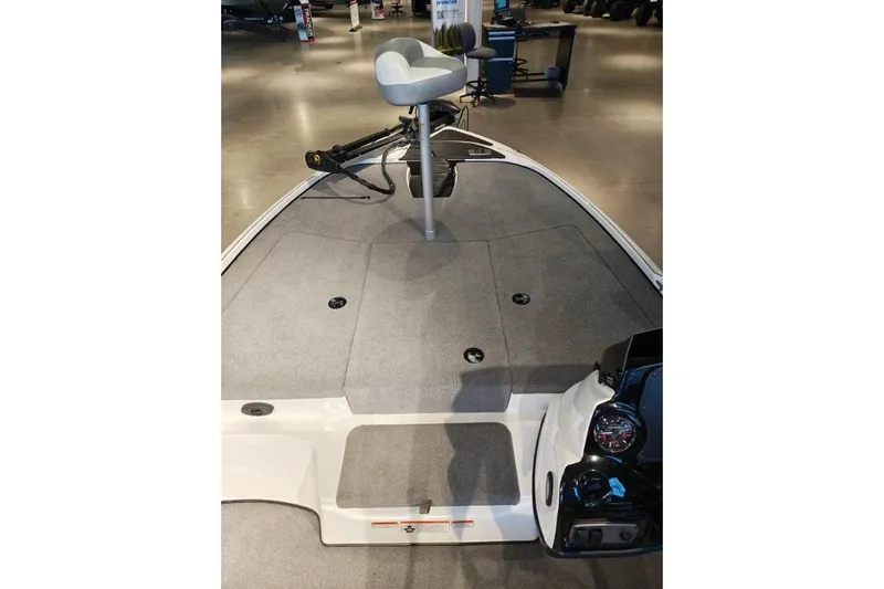 Slide: The Image of 2026 Nitro Z17 boat interior with gray carpet and seating. - 2