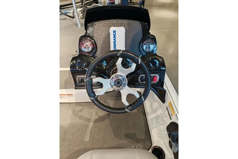 Slide: The Image of Steering console of a 2026 Nitro Z17 boat with Lowrance electronics. - 3