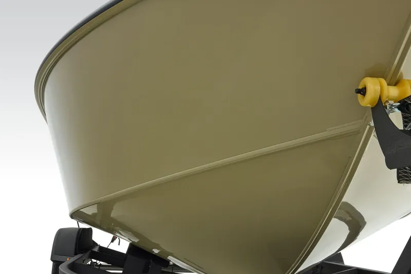 Slide: The Image of 2026 Tracker Targa V-19 Combo boat hull on trailer, close-up view. - 61