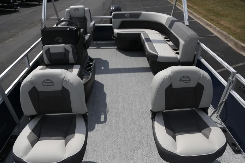 Slide: The Image of 2026 Sun Tracker Bass Buggy 16 XL Select pontoon boat interior with gray seating. - 2