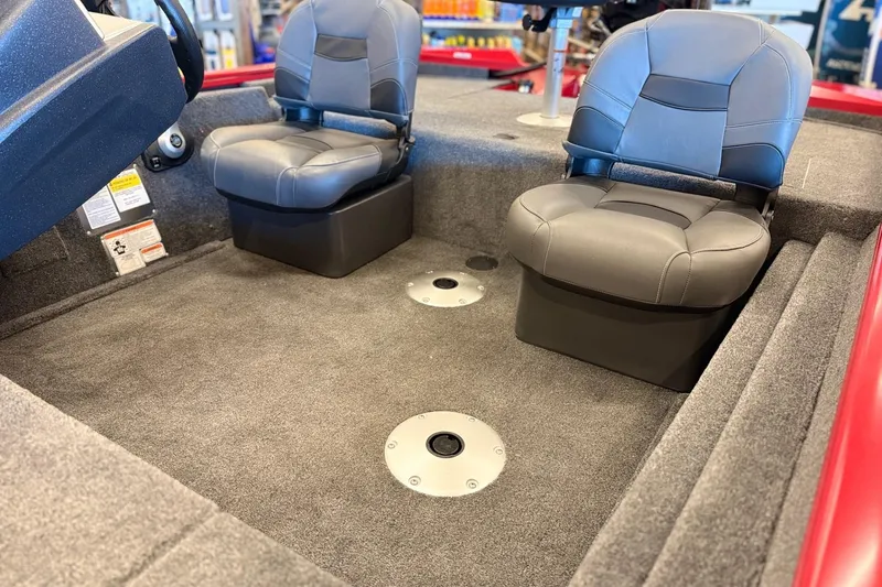 Slide: The Image of 2026 Tracker Pro Team 175 Crappie Edition boat interior with two gray seats. - 13