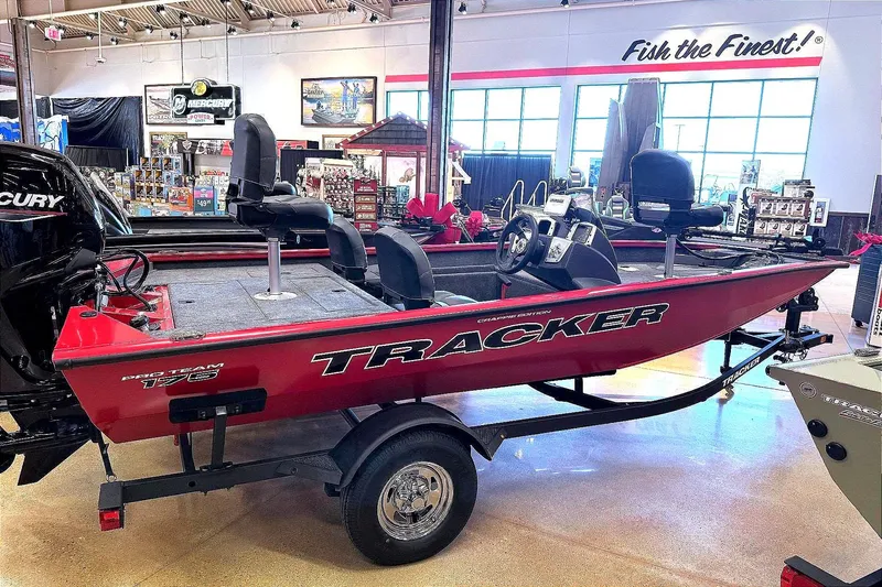 Slide: The Image of 2026 Tracker Pro Team 175 Crappie Edition boat displayed in showroom. - 5