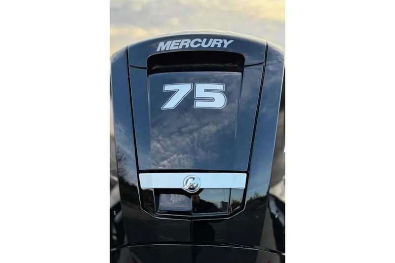 Slide: The Image of 2026 Tracker Pro Team 175 Crappie Edition boat on trailer, parked outdoors. - 21