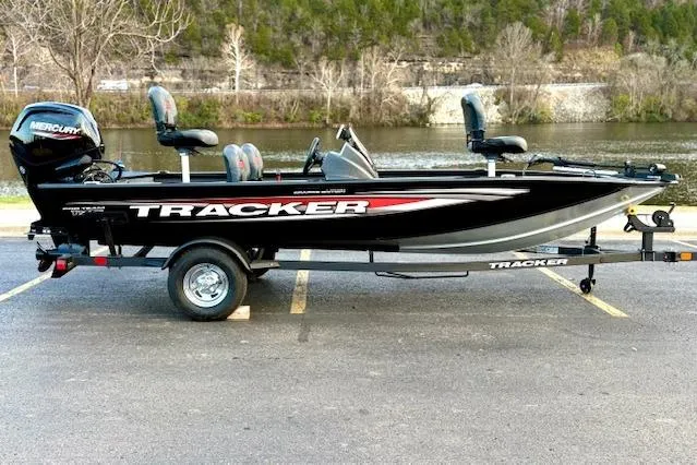 Slide: The Image of Trailer hitch of 2026 Tracker Pro Team 175 Crappie Edition boat on pavement. - 24