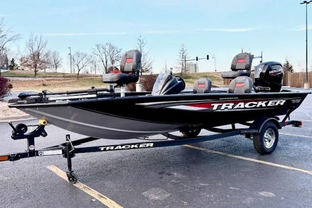 Slide: The Image of 2026 Tracker Pro Team 175 Crappie Edition boat interior with seating and storage compartments. - 30