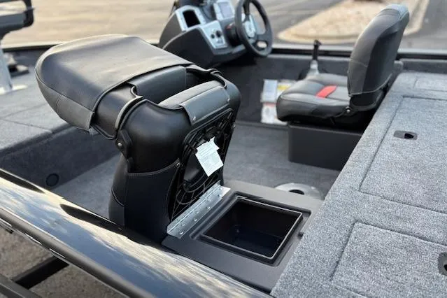 Slide: The Image of 2026 Tracker Pro Team 175 Crappie Edition boat with fishing rod holders and seating. - 7