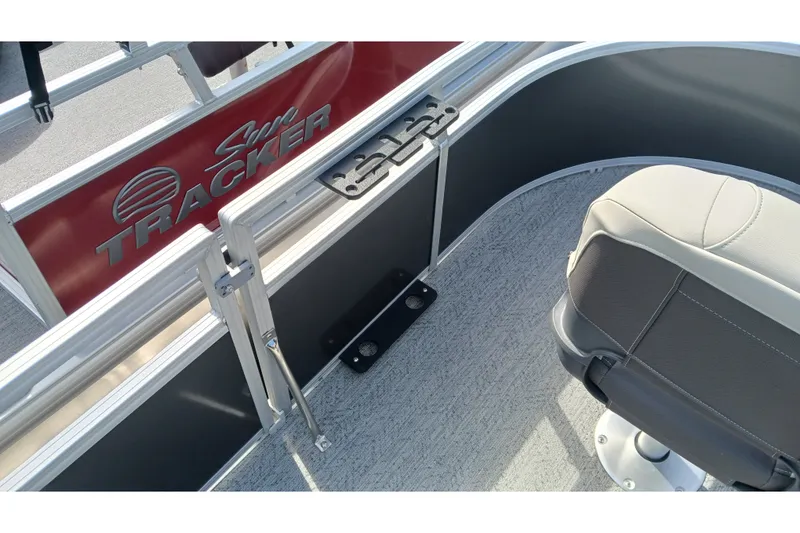 Slide: The Image of 2026 Sun Tracker Bass Buggy 16 XL Select interior with seating and railing details. - 14