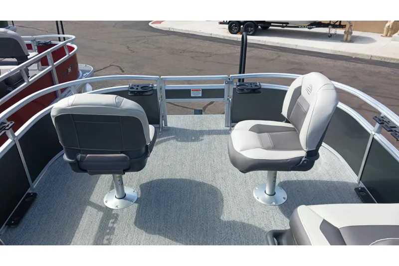 Slide: The Image of 2026 Sun Tracker Bass Buggy 16 XL Select pontoon boat with swivel seats on deck. - 13