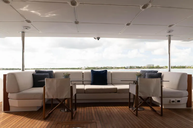 Slide: The Image of Luxurious 2023 Azimut yacht deck with elegant seating and scenic water view. - 23