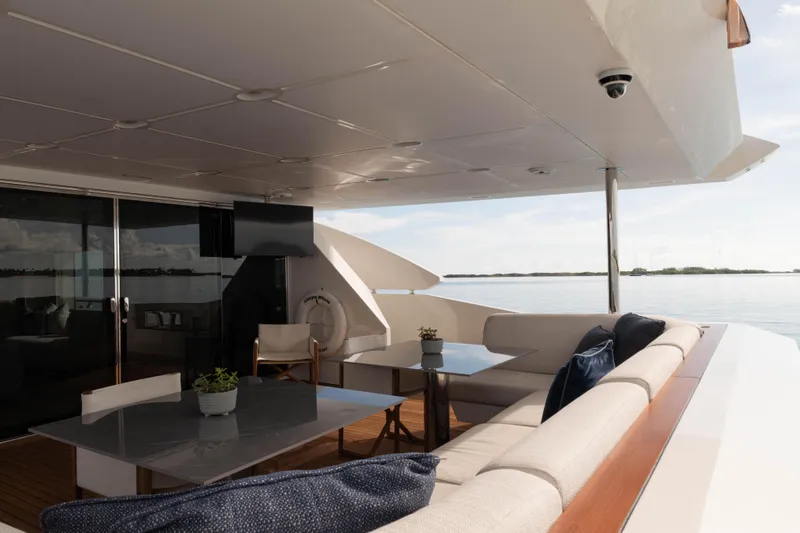 Slide: The Image of Luxurious 2023 Azimut yacht deck with elegant seating and ocean view. - 24