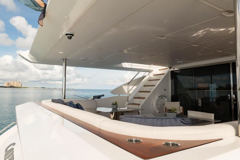 Slide: The Image of Luxurious 2023 Azimut yacht deck with seating, ocean view, and modern design. - 25