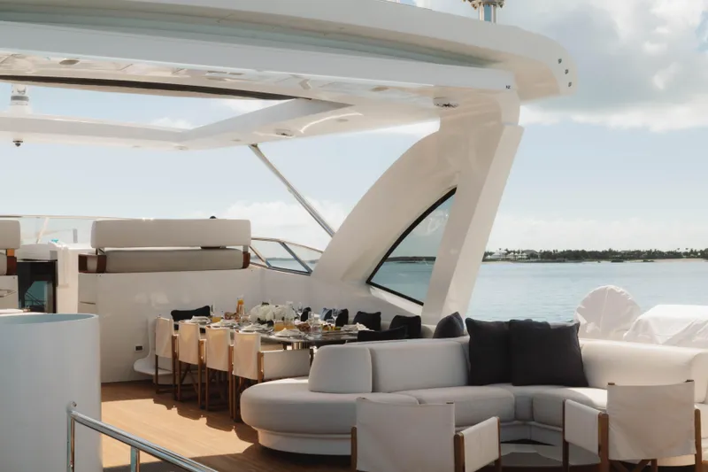 Slide: The Image of Luxurious 2023 Azimut yacht deck with elegant dining area and ocean view. - 30