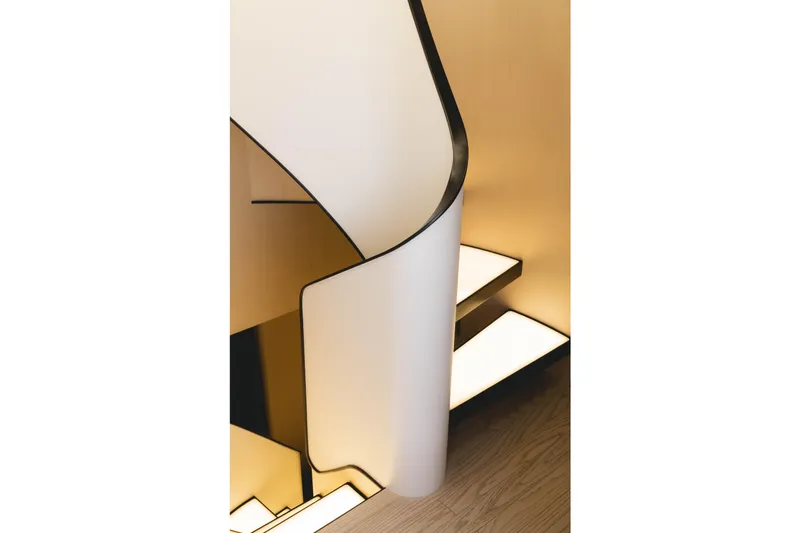 Slide: The Image of Modern spiral staircase with illuminated steps on a 2023 Azimut yacht. - 37