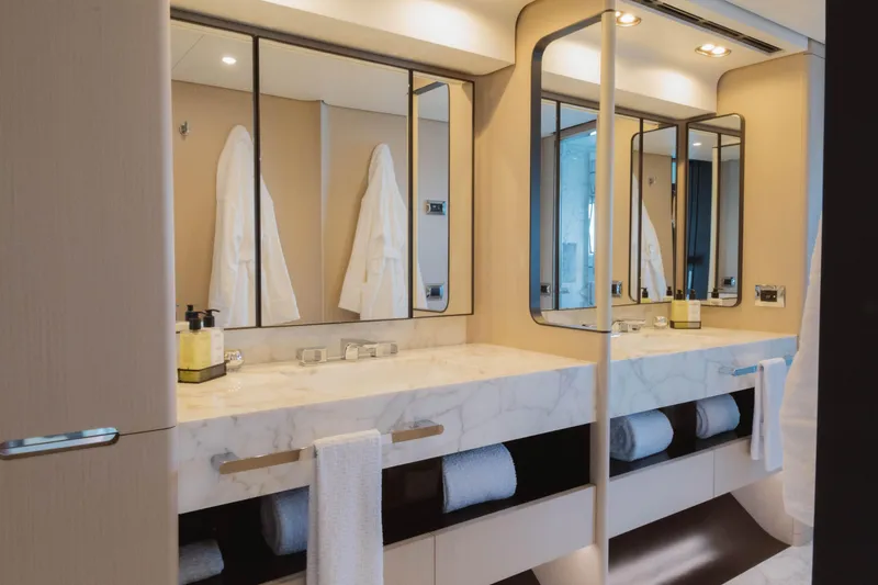 Slide: The Image of Luxurious bathroom in 2023 Azimut 32M Grande yacht with marble countertops and modern mirrors. - 45