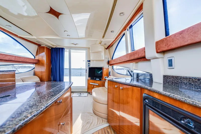 Slide: The Image of Luxurious interior of 2006 Meridian 341 Sedan yacht with modern amenities and ocean view. - 15