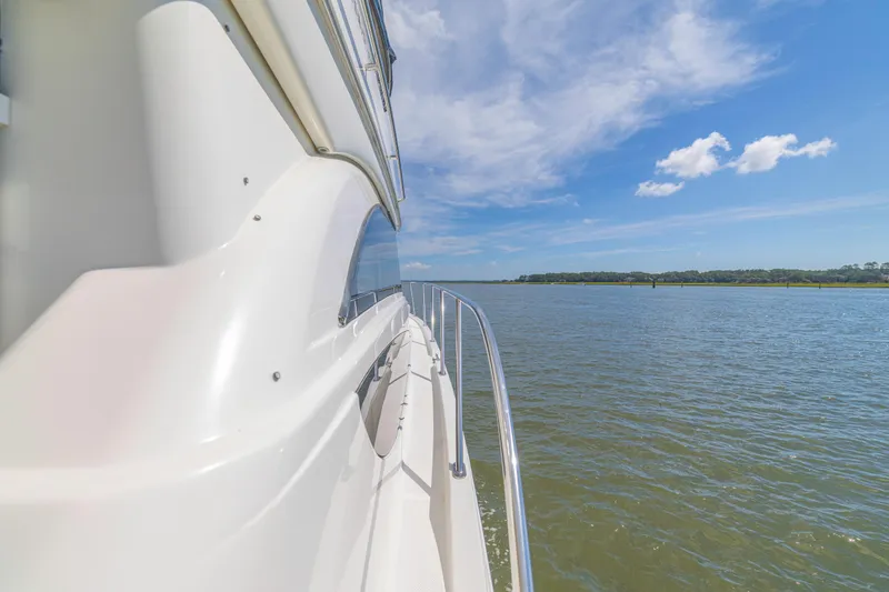 Slide: The Image of Side view of 2006 Meridian 341 Sedan yacht cruising on a sunny day. - 30