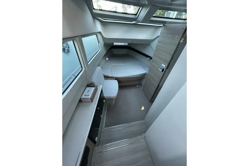 Slide: The Image of Interior of 2022 Saxdor 320 GTO boat, featuring modern design and comfortable seating. - 9