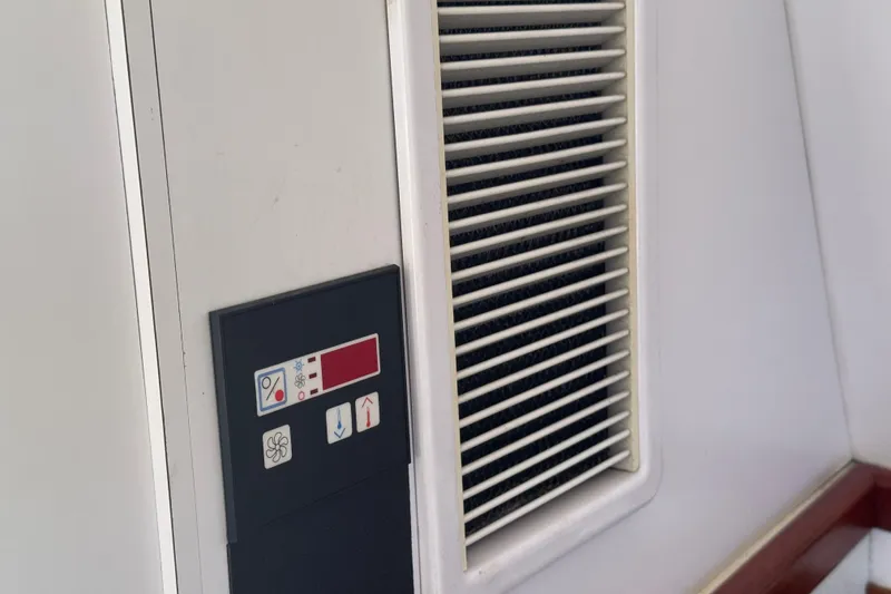 Slide: The Image of Control panel and vent on 1965 Hatteras 41 Convertible yacht interior. - 15