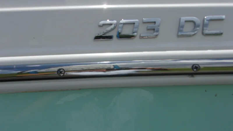 Slide: The Image of Close-up of 2023 NauticStar 203 DC boat model emblem. - 20