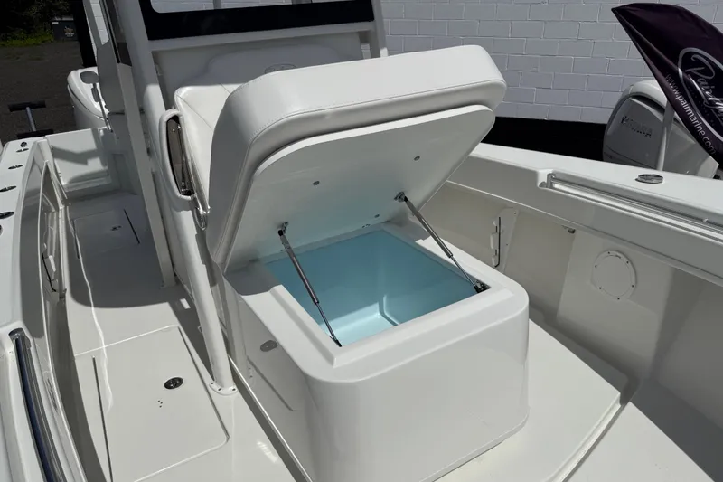 Slide: The Image of 2026 Pair Customs 28 Center Console livewell with transparent lid and dual engine setup. - 16