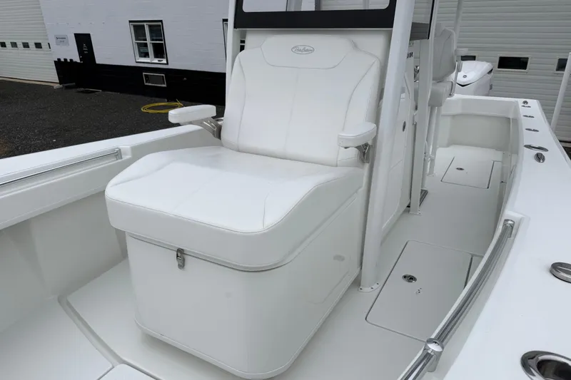 Slide: The Image of 2026 Pair Customs 28 Center Console boat with white seating and sleek design. - 19