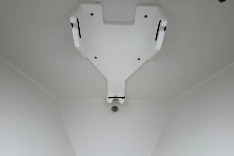 Slide: The Image of Bow of 2026 Pair Customs 28 Center Console boat with storage hatch. - 24