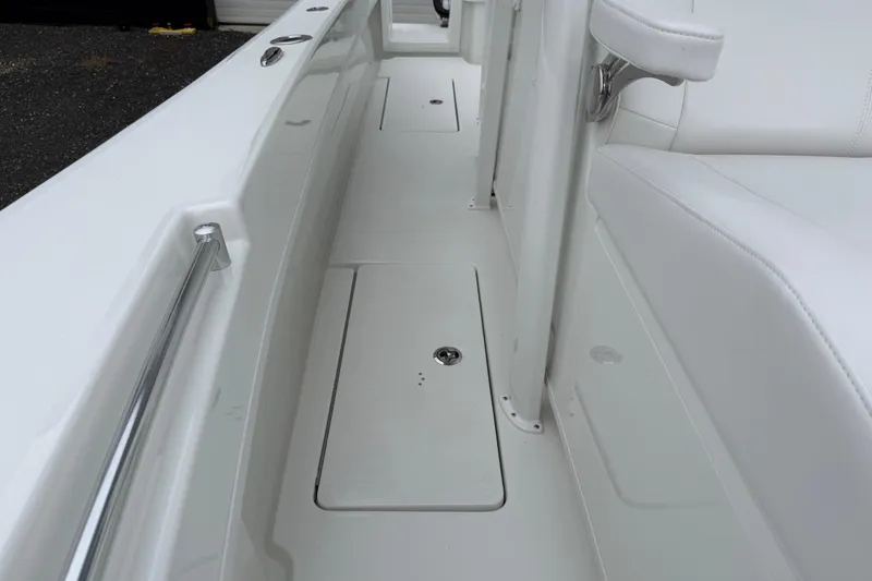 Slide: The Image of 2026 Pair Customs 28 Center Console interior ceiling with sleek, modern design. - 26