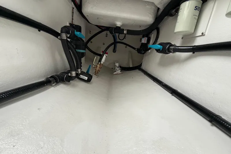 Slide: The Image of Interior view of 2026 Pair Customs 28 Center Console boat, featuring sleek flooring design. - 31