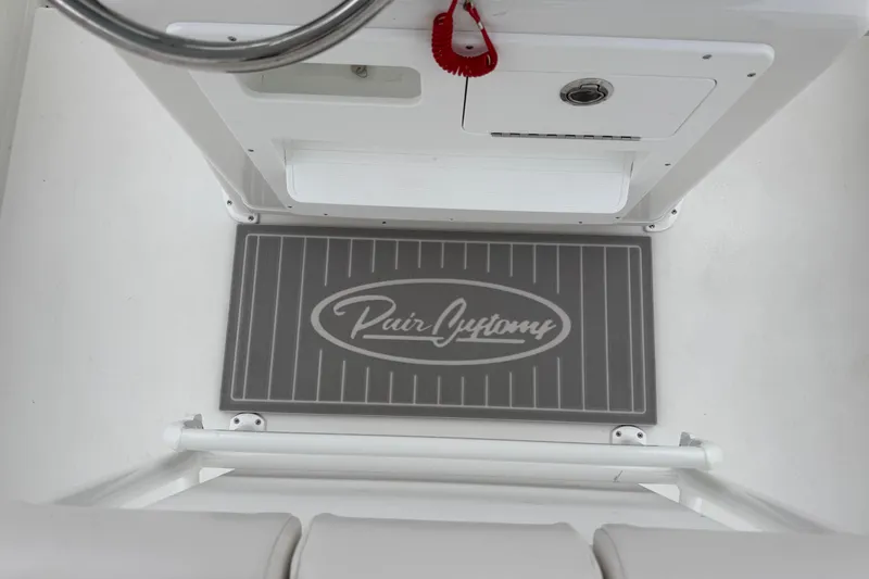 Slide: The Image of Interior view of 2026 Pair Customs 28 Center Console boat's wiring and plumbing system. - 33